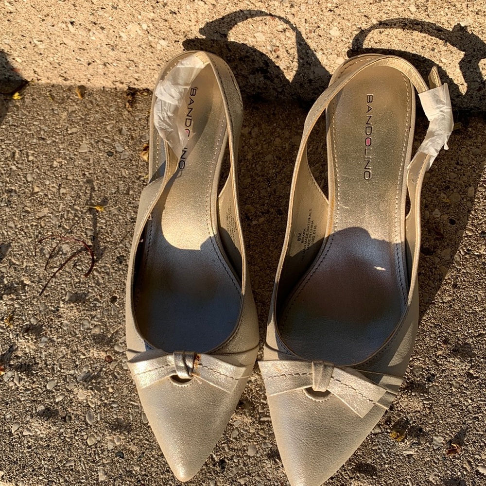Gold kitten heels.